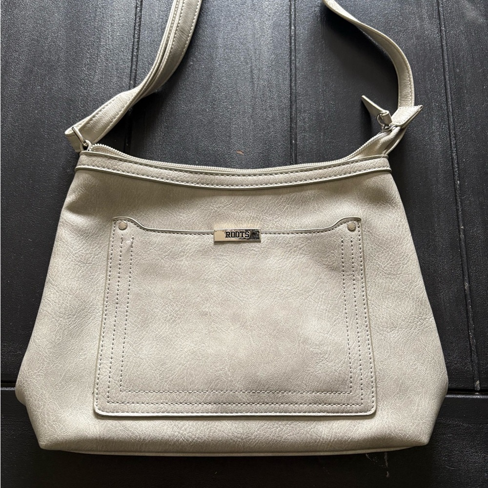 Roots Light Grey Crossbody Purse